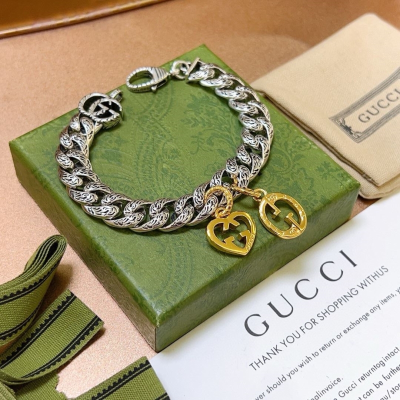 G*u*i bracelets